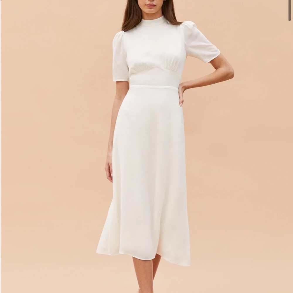 The Dusk Dress from Reformation.  Only worn once, like new condition